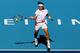BEIJING - OCTOBER 11: David Ferrer of Spain returns a shot to Novak Djokovic of Serbia during the final on day eleven of the 2010 China Open at the National Tennis Center on October 11, 2010 in Beijing, China. (Photo by Matthew Stockman/Getty Images)