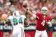 GLENDALE, AZ - SEPTEMBER 30: Quarterback Kevin Kolb #4 of the Arizona Cardinals throws a pass over defensive tackle Randy Starks #94 of the Miami Dolphins during the NFL game at the University of Phoenix Stadium on September 30, 2012 in Glendale, Arizona. The Carindals defeated the Dolphins 24-21 in overtime. (Photo by Christian Petersen/Getty Images)