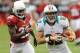 GLENDALE, AZ - SEPTEMBER 30: Brian Hartline #82 of the Miami Dolphins runs with the ball while being chased by William Gay #22 of the Arizona Cardinals at University of Phoenix Stadium on September 30, 2012 in Glendale, Arizona. (Photo by Norm Hall/Getty Images)