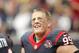 Sep 30, 2012; Houston, TX, USA; Houston Texans defensive end J.J. Watt (99) smiles on the sidelines against the Tennessee Titans in the fourth quarter at Reliant Stadium. The Texans defeated the Titans 38-14. Mandatory Credit: Brett Davis-US PRESSWIRE