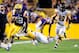 BATON ROUGE, LA - SEPTEMBER 29: Jordan Dangerfield #20 of the Towson Tigers makes a diving tackle of Michael Ford #42 of the LSU Tigers during a game at Tiger Stadium on September 29, 2012 in Baton Rouge, Louisiana. LSU would win the game 38-22. (Photo by Stacy Revere/Getty Images)
