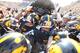 IOWA CITY, IA- SEPTEMBER 29: Members of the Iowa Hawkeyes rushes the field to grab the Floyd of Rosedale trophy from the Minnesota Gophers on September 29, 2012 at Kinnick Stadium in Iowa City, Iowa. Iowa defeated Minnesota 31-13. (Photo by Matthew Holst/Getty Images)