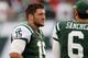 EAST RUTHERFORD, NJ - SEPTEMBER 30: Tim Tebow #15 and Mark Sanchez #6 of the New York Jets look on from the sideline in the fourth quarter against the San Francisco 49ers on September 30, 2012 at MetLife Stadium in East Rutherford, New Jersey.The San Francisco 49ers defeated the New York Jets 34-0. (Photo by Elsa/Getty Images)