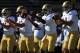BOULDER, CO - SEPTEMBER 29: Quarterback Brett Hundley (2R) #17 of the UCLA Bruins warms up with the quarterbacks prior to facing the Colorado Buffaloes at Folsom Field on September 29, 2012 in Boulder, Colorado. UCLA defeated Colorado 42-14. (Photo by Doug Pensinger/Getty Images)