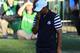 Tiger Woods earned only a half point for the American team