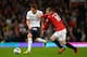 MANCHESTER, ENGLAND - SEPTEMBER 29: Gylfi Sigurdsson of Tottenham Hotspur and Wayne Rooney of Manchester United battle for the ball during the Barclays Premier League match between Manchester United and Tottenham Hotspur at Old Trafford on September 29, 2012 in Manchester, England. (Photo by Shaun Botterill/Getty Images)