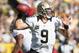GREEN BAY, WI - SEPTEMBER 30: Quarterback Drew Brees #9 of the New Orleans Saints drops back to pass against the Green Bay Packers at Lambeau Field on September 30, 2012 in Green Bay, Wisconsin. (Photo by Jeff Gross/Getty Images)