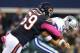 ARLINGTON, TX - OCTOBER 01: Henry Melton #69 of the Chicago Bears sacks quarterback Tony Romo #9 of the Dallas Cowboys in the first quarter at Cowboys Stadium on October 1, 2012 in Arlington, Texas. (Photo by Ronald Martinez/Getty Images)