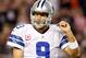 ARLINGTON, TX - OCTOBER 01: Tony Romo #9 of the Dallas Cowboys walks off the field after throwing his fifth interception against the Chicago Bears at Cowboys Stadium on October 1, 2012 in Arlington, Texas. The Chicago Bears beat the Dallas Cowboys 34-18. (Photo by Tom Pennington/Getty Images)
