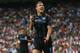 MADRID, SPAIN - SEPTEMBER 18: Edin Dzeko of Manchester City FC celebrates after scoring the opening goal during the UEFA Champions League Group D match between Real Madrid and Manchester City FC at Estadio Santiago Bernabeu on September 18, 2012 in Madrid, Spain. (Photo by Alex Livesey/Getty Images)