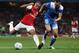 LONDON, ENGLAND - SEPTEMBER 28: Alex Oxlade-Chamberlain of Arsenal is tracked by of Olympiacos during the UEFA Champions League Group F match between Arsenal and Olympiacos at the Emirates Stadium on September 28, 2011 in London, England. (Photo by Clive Rose/Getty Images)