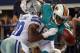 ARLINGTON, TX - AUGUST 29: Teddy Williams #20 of the Dallas Cowboys breaks up a pass intended for Legedu Naanee #19 of the Miami Dolphins during a preseason game at Cowboys Stadium on August 29, 2012 in Arlington, Texas. (Photo by Ronald Martinez/Getty Images)