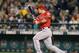 SEATTLE, WA - OCTOBER 01: Mike Trout #27 of the Los Angeles Angels of Anaheim triples for his fourth hit of the game in the sixth inning against the Seattle Mariners at Safeco Field on October 1, 2012 in Seattle, Washington. (Photo by Otto Greule Jr/Getty Images)