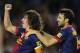 BARCELONA, SPAIN - AUGUST 19: Carles Puyol of FC Barcelona (L) celebrates with his teammates Cesc Fabregas of FC Barcelona after scoring the opening goal during the La Liga match between FC Barcelona and Real Sociedad de Futbol at Camp Nou on August 19, 2012 in Barcelona, Spain. (Photo by David Ramos/Getty Images)