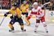 NASHVILLE, TN - MARCH 10: Jiri Hudler #26 of the Detroit Red Wings skates against Ryan Suter #20 of the Nashville Predators at Bridgestone Arena on March 10, 2012 in Nashville, Tennessee. (Photo by Frederick Breedon/Getty Images)