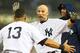 NEW YORK, NY - OCTOBER 02: Raul Ibanez #27 of the New York Yankees celebrates with Alex Rodriguez #13 after hitting a walk-off single against the Boston Red Sox in the twelfth inning to win the game 4-3 on October 2, 2012 at Yankee Stadium in the Bronx borough of New York City (Photo by Al Bello/Getty Images)