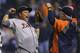 KANSAS CITY, MO - OCTOBER 1: Miguel Cabrera #24 of the Detroit Tigers and bullpen coach Mike Rojas celebrate after winning the American League Central title at Kauffman Stadium on October 1, 2012 in Kansas City, Missouri. (Photo by Ed Zurga/Getty Images)