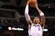 DALLAS, TX - FEBRUARY 13: Shawn Marion #0 of the Dallas Mavericks takes a shot against Chris Paul #3 of the Los Angeles Clippers at American Airlines Center on February 13, 2012 in Dallas, Texas. NOTE TO USER: User expressly acknowledges and agrees that, by downloading and/or using this Photograph, user is consenting to the terms and conditions of the Getty Images License Agreement. (Photo by Ronald Martinez/Getty Images)