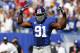 Sep 16, 2012; East Rutherford, NJ, USA; New York Giants defensive end Justin Tuck (91) during the first half against the Tampa Bay Buccaneers at MetLife Stadium. Mandatory Credit: Jim O'Connor-US PRESSWIRE