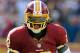 LANDOVER, MD - SEPTEMBER 23: Robert Griffin III #10 of the Washington Redskins runs for 19-yards against the Cincinnati Bengals in the fourth quarter at FedExField on September 23, 2012 in Landover, Maryland. (Photo by Patrick McDermott/Getty Images)