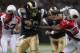 ST. LOUIS - SEPTEMBER 12: Steven Jackson #39 of the St. Louis Rams looks to get past Adrian Wilson #24 of the Arizona Cardinals during the NFL season opener at the Edward Jones Dome on September 12, 2010 in St. Louis, Missouri. The Cardinals beat the Rams 17-13. (Photo by Dilip Vishwanat/Getty Images)