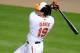 BALTIMORE, MD - SEPTEMBER 26: Chris Davis #19 of the Baltimore Orioles hits a two run home run in the seventh inning during a baseball game against the Toronto Blue Jays on September 26, 2012 at Oriole Park at Camden Yards in Baltimore, Maryland. (Photo by Mitchell Layton/Getty Images)