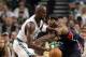 BOSTON, MA - MAY 10: Kevin Garnett #5 of the Boston Celtics heads for the net as Josh Smith #5 of the Atlanta Hawks in Game Six of the Eastern Conference Quarterfinals in the 2012 NBA Playoffs on May 10, 2012 at TD Garden in Boston, Massachusetts. The Boston Celtics defeated the Atlanta Hawks 83-80. NOTE TO USER: User expressly acknowledges and agrees that, by downloading and or using this photograph, User is consenting to the terms and conditions of the Getty Images License Agreement. (Photo by Elsa/Getty Images)