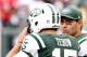 Sept. 30, 2012; East Rutherford, NJ, USA; New York Jets quarterback Mark Sanchez (6) talks with quarterback Tim Tebow (15) on the sidelines against the San Francisco 49ers during the second half at MetLife Stadium. 49ers won 34-0. Mandatory Credit: Debby Wong-US PRESSWIRE