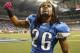 DETROIT - OCTOBER 10: Louis Delmas #26 of the Detroit Lions gets the fans pumped up prior to the start of the game against the Chicago Bears at Ford Field on October 10, 2011 in Detroit, Michigan. (Photo by Leon Halip/Getty Images)