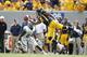 MORGANTOWN, WV - SEPTEMBER 29: J.D. Woods #81 of the West Virginia Mountaineers makes a one handen catch in the second half against the Baylor Bears during the game on September 29, 2012 at Mountaineer Field in Morgantown, West Virginia. WVU defeated Baylor 70-63. (Photo by Justin K. Aller/Getty Images)