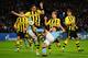 MANCHESTER, ENGLAND - OCTOBER 03: Neven Subotic of Borussia Dortmund concedes a penalty kick under pressure from Sergio Aguero of Manchester City during the UEFA Champions League Group D match between Manchester City and Borussia Dortmund at the Etihad Stadium on October 3, 2012 in Manchester, England. (Photo by Stu Forster/Getty Images)