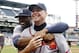 October 3, 2012; Pittsburgh, PA, USA; Atlanta Braves right fielder Jason Heyward (rear) embraces Braves third baseman Chipper Jones (10) as they leave the field after defeating the Pittsburgh Pirates at PNC Park. The Atlanta Braves won 4-0. Mandatory Credit: Charles LeClaire-US PRESSWIRE