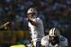 GREEN BAY, WI - SEPTEMBER 30: Drew Brees #9 of the New Orleans Saints points out a defensive formation against the Green Bay Packers at Lambeau Field on September 30, 2012 in Green Bay, Wisconsin. The Packers defeated the Saints 28-27. (Photo by Jonathan Daniel/Getty Images)