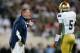 EAST LANSING, MI - SEPTEMBER 15: Head coach Brian Kelly of the Notre Dame Fighting Irish talks to quarterback Everett Golson #5 while playing the Michigan State Spartans at Spartan Stadium Stadium on September 15, 2012 in East Lansing, Michigan. Notre Dame won the game 20-3. (Photo by Gregory Shamus/Getty Images)