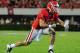 ATHENS, GA - SEPTEMBER 22: Aaron Murray #11 of the Georgia Bulldogs celebrates after a touchdown against the Vanderbilt Commodores at Sanford Stadium on September 22, 2012 in Athens, Georgia. (Photo by Scott Cunningham/Getty Images)