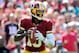 LANDOVER, MD - SEPTEMBER 23: Robert Griffin III #10 of the Washington Redskins drops back to pass against the Cincinnati Bengals during a game at FedExField on September 23, 2012 in Landover, Maryland. (Photo by Patrick McDermott/Getty Images)