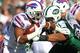 ORCHARD PARK, NY - NOVEMBER 6: Fred Jackson #22 of the Buffalo Bills rushes during NFL game action as Sione Pouha #91 of the New York Jets tries to make the tackle at Ralph Wilson Stadium on November 6, 2011 in Orchard Park, New York. (Photo by Tom Szczerbowski/Getty Images)