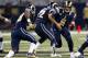 ST. LOUIS, MO - SEPTEMBER 30: Quarterback Sam Bradford #8 of the St. Louis Rams stretches to hand off the ball to running back Steven Jackson #39 of the St. Louis Rams during the game against the Seattle Seahawks at the Edward Jones Dome on September 30, 2012 in St. Louis, Missouri. The Rams beat the Seahawks 19-13. (Photo by David Welker/Getty Images)