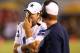 SAN DIEGO, CA - AUGUST 18: Quarterback Tony Romo #9 and head coach Jason Garrett of the Dallas Cowboys talk things over during a Cowboy drive in the fourth quarter against the San Diego Chargers at Qualcomm Stadium on August 18, 2012 in San Diego, California. The Chargers won 28-20. (Photo by Stephen Dunn/Getty Images)