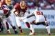 Sept. 30, 2012; Tampa FL, USA; Washington Redskins running back Alfred Morris (46) runs past Tampa Bay Buccaneers cornerback Eric Wright (21) for a touchdown during the first half at Raymond James Stadium. Mandatory Credit: Matt Stamey-US PRESSWIRE