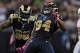 October 4, 2012; St. Louis, MO, USA; St. Louis Rams defensive end Robert Quinn (94) celebrates after sacking Arizona Cardinals quarterback Kevin Kolb (not pictured) during the second half at the Edward Jones Dome. St. Louis defeated Arizona 17-3. Mandatory Credit: Jeff Curry-US PRESSWIRE