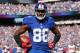 Sep 16, 2012; East Rutherford, NJ, USA; New York Giants wide receiver Hakeem Nicks (88) poses for cameras after scoring a second quarter touchdown against the Tampa Bay Buccaneers at MetLife Stadium. Mandatory Credit: Jim O'Connor-US PRESSWIRE