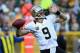 GREEN BAY, WI - SEPTEMBER 30: Quarterback Drew Brees #9 of the New Orleans Saints drops back to pass against the Green Bay Packers at Lambeau Field on September 30, 2012 in Green Bay, Wisconsin. (Photo by Jeff Gross/Getty Images)
