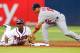 ATLANTA, GA - MAY 29: Michael Bourn #24 of the Atlanta Braves slides back safely at second base under the tag of Rafael Furcal #15 of the St. Louis Cardinals on a single by Martin Prado #14 at Turner Field on May 29, 2012 in Atlanta, Georgia. (Photo by Kevin C. Cox/Getty Images)
