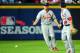 Matt Holliday and Pete Kozma let a fly ball drop between them in the eighth inning of the NL wild-card playoff.