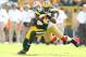 GREEN BAY, WI - SEPTEMBER 09: Greg Jennings #85 of the Green Bay Packers runs with the ball while defended by Patrick Willis #52 of the San Francisco 49ers during the NFL season opener at Lambeau Field on September 9, 2012 in Green Bay, Wisconsin. (Photo by Andy Lyons/Getty Images)
