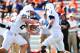 Sep 29, 2012; Champaign, IL, USA; Penn State Nittany Lions quarterback Matthew McGloin (11) hands the ball off to running back Zach Zwinak (28) during the third quarter against the Illinois Fighting Illini at Memorial Stadium. Mandatory Credit: Bradley Leeb-US PRESSWIRE