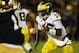 SOUTH BEND, IN - SEPTEMBER 22: Quarterback Denard Robinson #16 of the Michigan Wolverines runs for a first down in the third quarter against the Notre Dame Fighting Irish at Notre Dame Stadium on September 22, 2012 in South Bend, Indiana. (Photo by Jonathan Daniel/Getty Images)