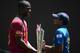 COLOMBO, SRI LANKA - OCTOBER 06: Darren Sammy, captain of West Indies, Mahela Jayawardene, captain of Sri Lanka pose with the ICC World T20 trophy ahead of the 2012 ICC World Twenty20 Final at R. Premadasa Stadium on October 6, 2012 in Colombo, Sri Lanka. (Photo by Gareth Copley/Getty Images)