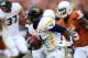 AUSTIN, TX - OCTOBER 06: Tavon Austin #1 of the West Virginia Mountaineers returns a kickoff against the Texas Longhorns at Darrell K Royal-Texas Memorial Stadium on October 6, 2012 in Austin, Texas. (Photo by Ronald Martinez/Getty Images)